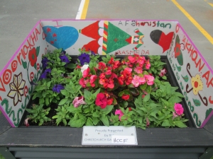 2014 Festival of Flowers planter box with artwork by Hagley Community College students.