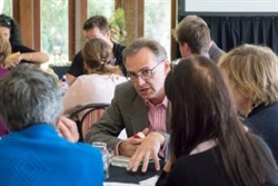 Attendees having a discussion during one of the breakout session.